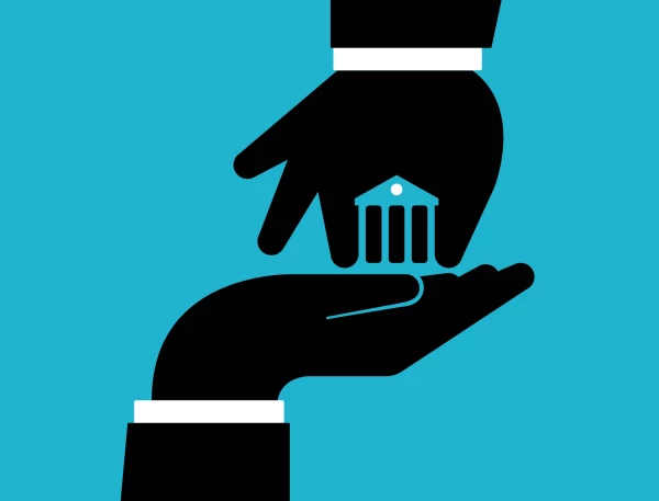 Graphic image of one hand giving another hand a small bank building