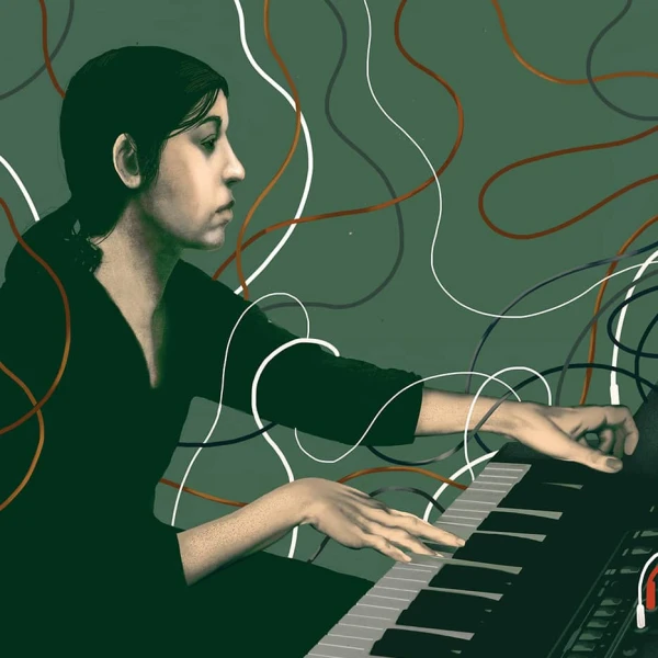 Portrait of musician Suzanne Ciani at a keyboard, surrounded by cables