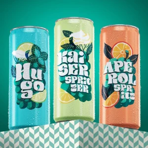 Image of 3 beverage cans illustrated with vibrantly-colored flowers and citrus. Illustration by Julia Kerschbaumer, Food & Beverage, Decorative, 