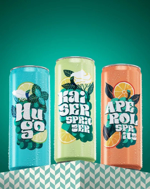 Image of 3 beverage cans illustrated with vibrantly-colored flowers and citrus. Illustration by Julia Kerschbaumer, Food & Beverage, Decorative, 